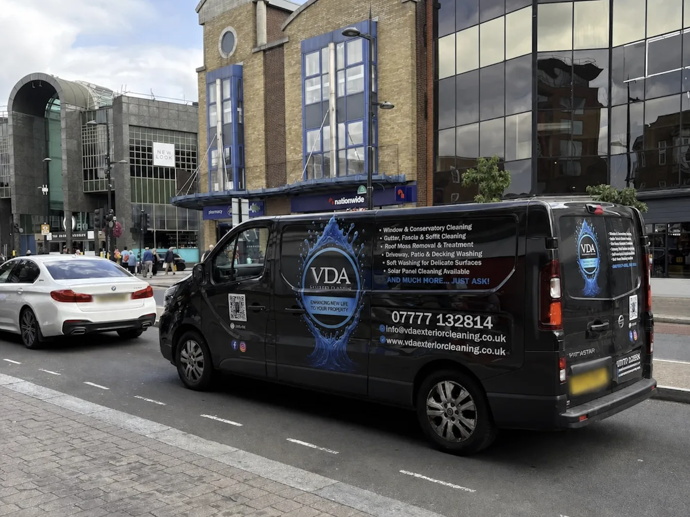 VDA Exterior Cleaning branded van parked on a South East London high street